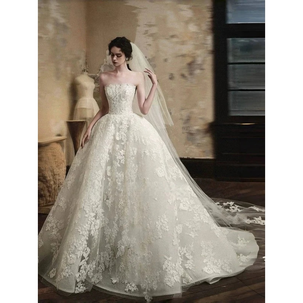 Robes de mariée sans bretelles personnalisées avec de superbes applications en dentelle et vestime nuptiale silhouette en ligne florale Vestidos