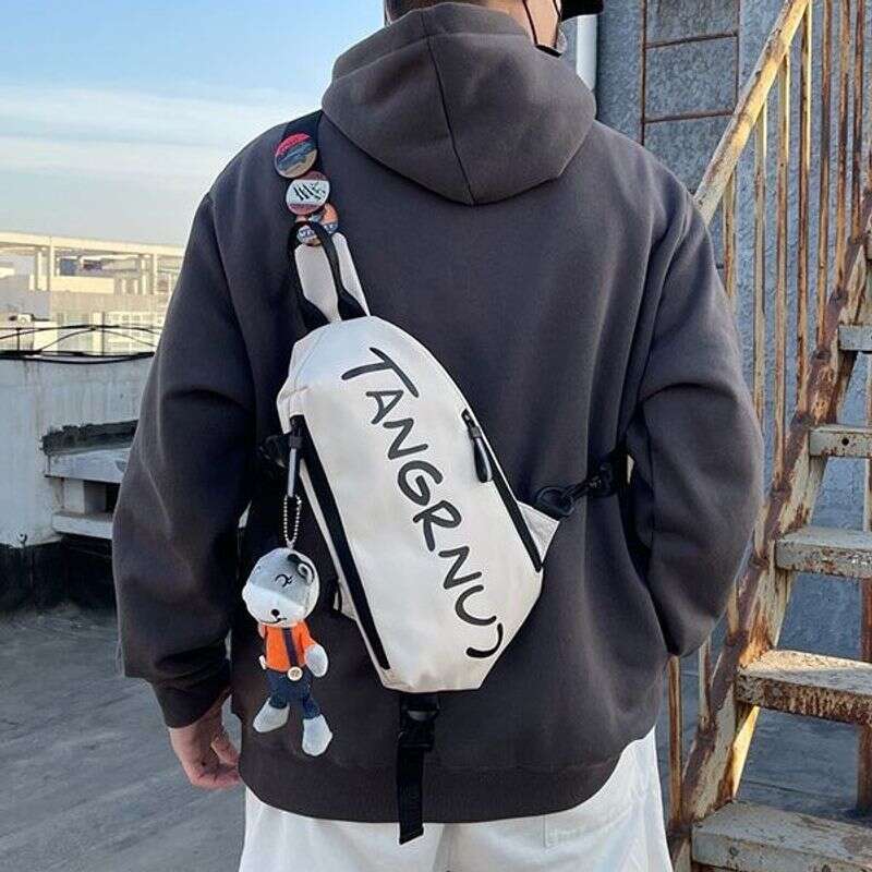Men's fashion brand messenger boys leisure sports large capacity high end shoulder girls Japanese chest bag