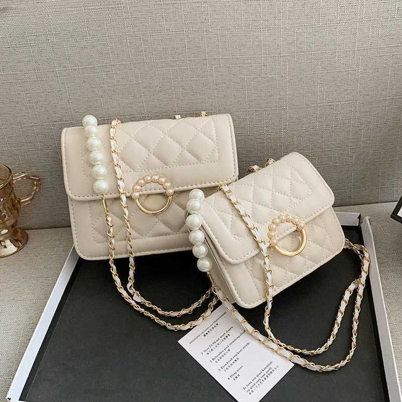 Sacs à bandouliers pour femmes perles mode diamant treillis Pu Hand Sac Femme Cross Corps Chaîne Ol Temperament Luxury Mini Villument TRENDY XJ25