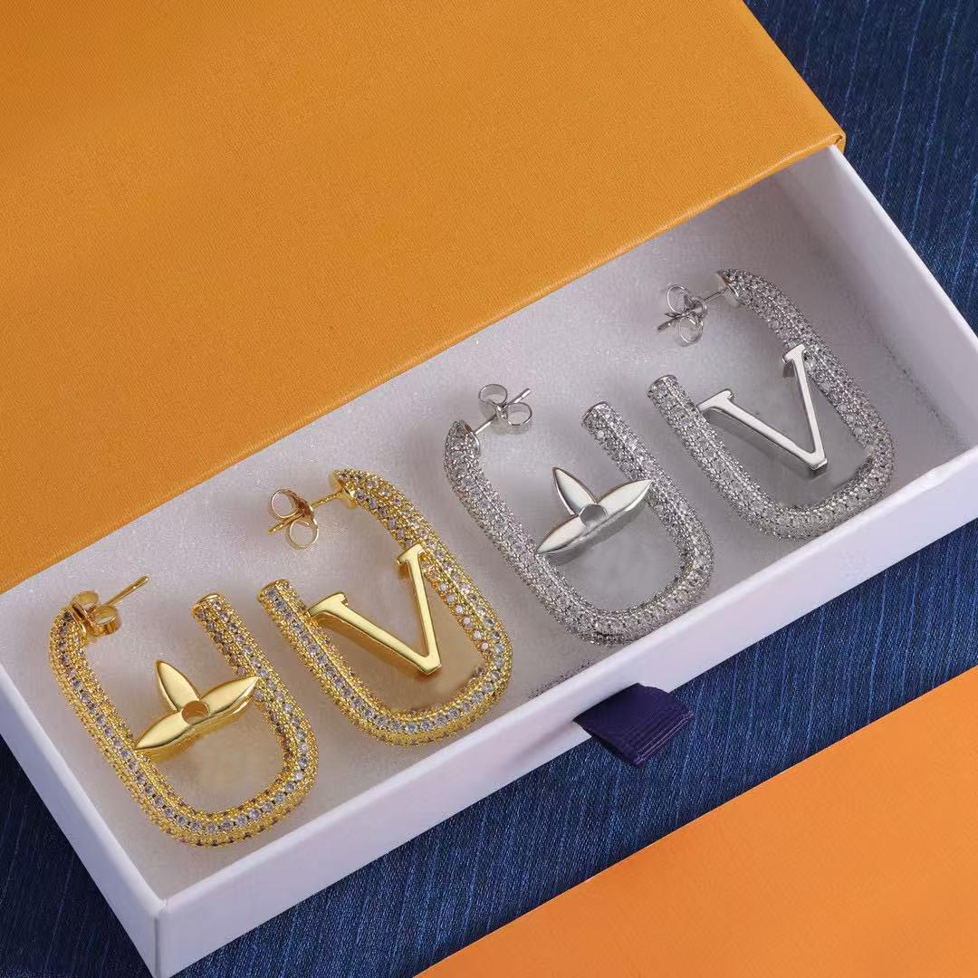 Luxury designer full diamond earrings for women in gold and silver. Fashionable and exquisite earrings for gift.
