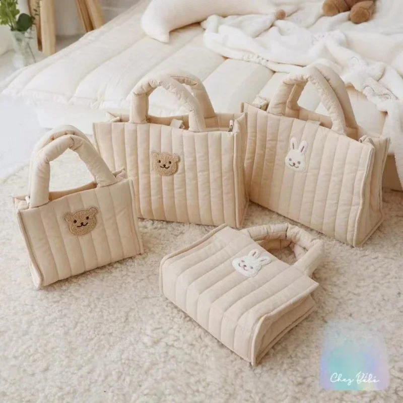 Little Bear Rabbit Down Handbag Korean Fashion Womens Bag Minimalist Car Sewn Vertical Stripe Casual Wrist Bag purse 250814