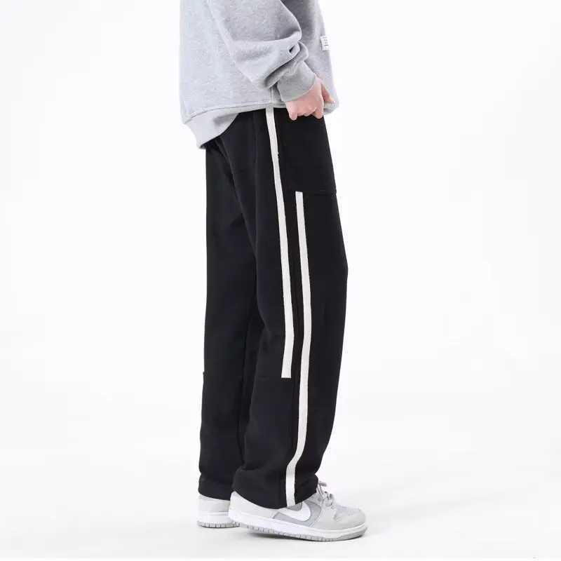 Été Nouveau pantalon décontracté lâche Pantalon long des jambes longues et polyvalentes pantalons de survêtement de la jambe noire mince et polyv