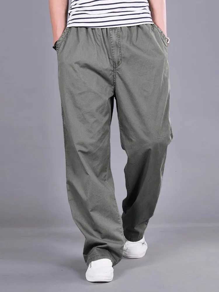 Pantalons de randonnée extérieure d'été pour hommes minces imperméables séchés rapides socles de travail de coquille molle pantalon oversize xj25