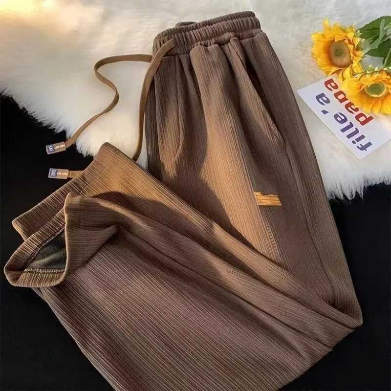 Pantalon de jambe large pour les hommes minces d'été.