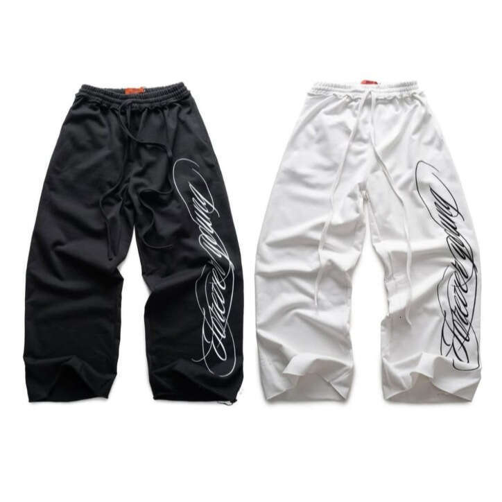 Automne American Street Style Lettre imprimé Pantalon de survêtement Unisexe Hip Hop Hop Pantalon long lâche à jambes lâches B5