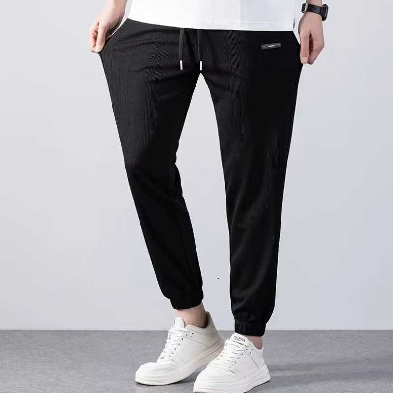 Été pour hommes pantalons décontractés sans repasser pantalon droit de jambe mince en vrac respirant simple polyvalent et pantalon sportif haren