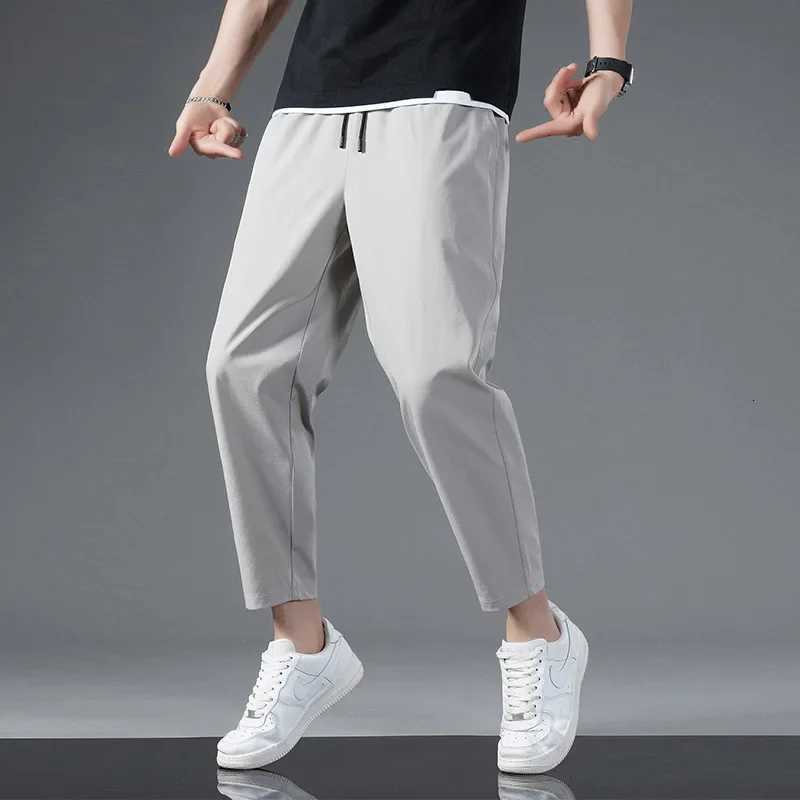 125KG Big Size Summer Ice Silk Crop Pants Mens Elastic Casual Edition Trendy Loose and Quick Drying Sports Large Crop Pants XJ250821