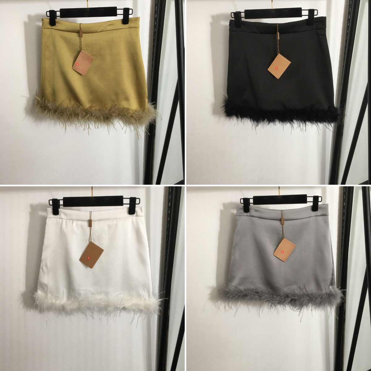 Joupes de créateur de plumes vintage jupe sexy de luxe 4 couleurs charm