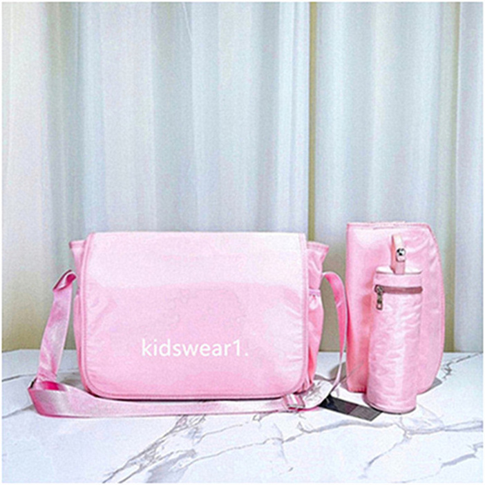 Sacs à couches Mummy Baby Sac à dos avec station de changement de pliage Station de maman portable Brochets de poussette pour les couches de sac