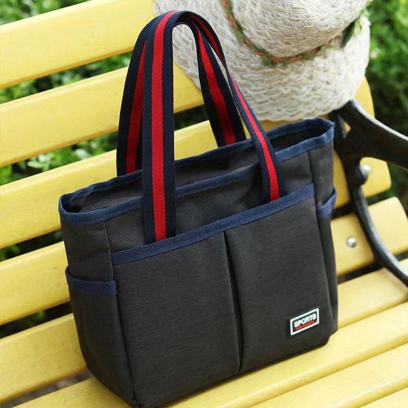 New Canvas Women's Bag Handbag Casual Bag Mommy Lunch Bag Solid Color Retro Luxury Bagdesigner Free Shipping Handbag White Groove Manufacturer