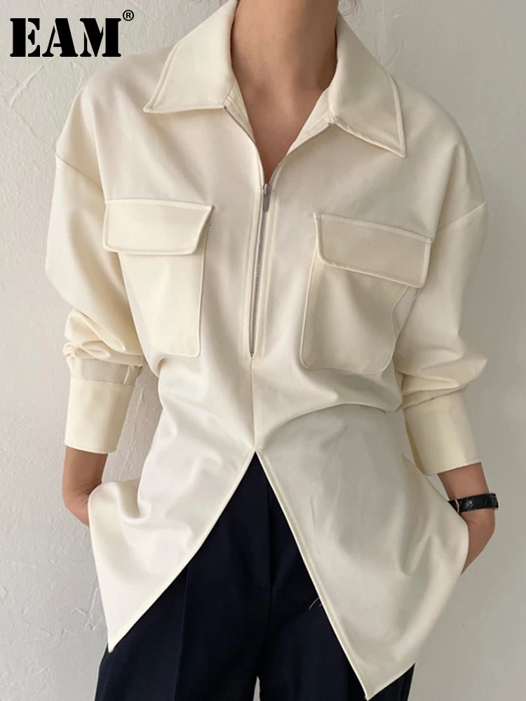 EAM Women Beige Zipper Pocket Back Bandage Blouse Lapel Long Sleeve Loose Fit Shirt Fashion Spring Autumn 1DF1491 250822