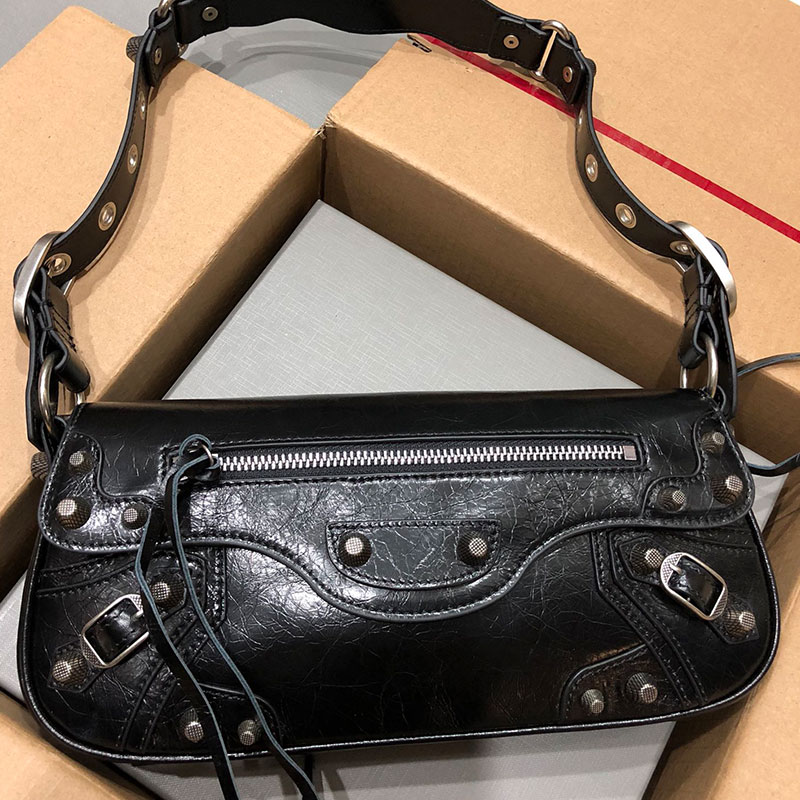 Womens Le City Pouch On Strap in Framboise designer fashion bag luxury womens bag 2025 new sling bag comes zipped closure with knotted leather pulle