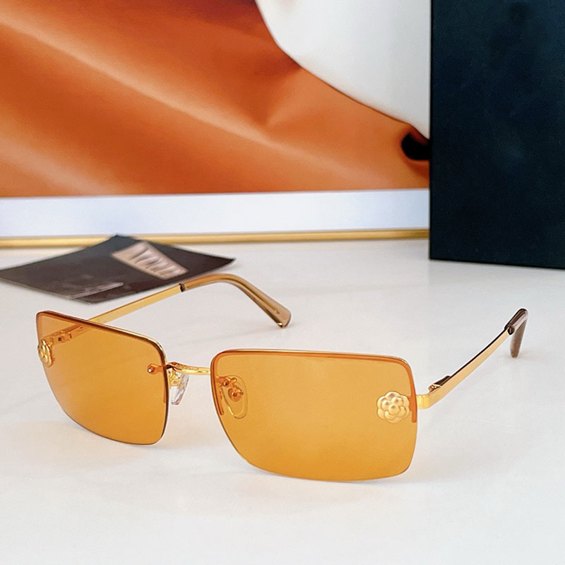 Women Classic Frameless Sunglasses Designer Frameless Rectangular Frame Orange Lens Decoration Flower Fashion Unique Design Personalized Sunglasses