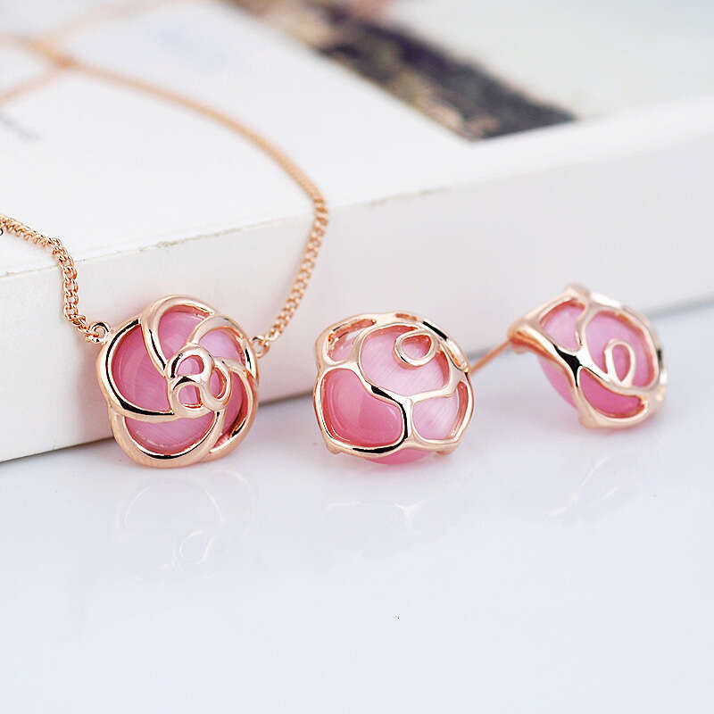 Dhpet Red Apple Edition Corée Fashion Hollow Rose Imitation Cat's Eye Stone Colliers Boucles d'oreilles Bijoux 400481