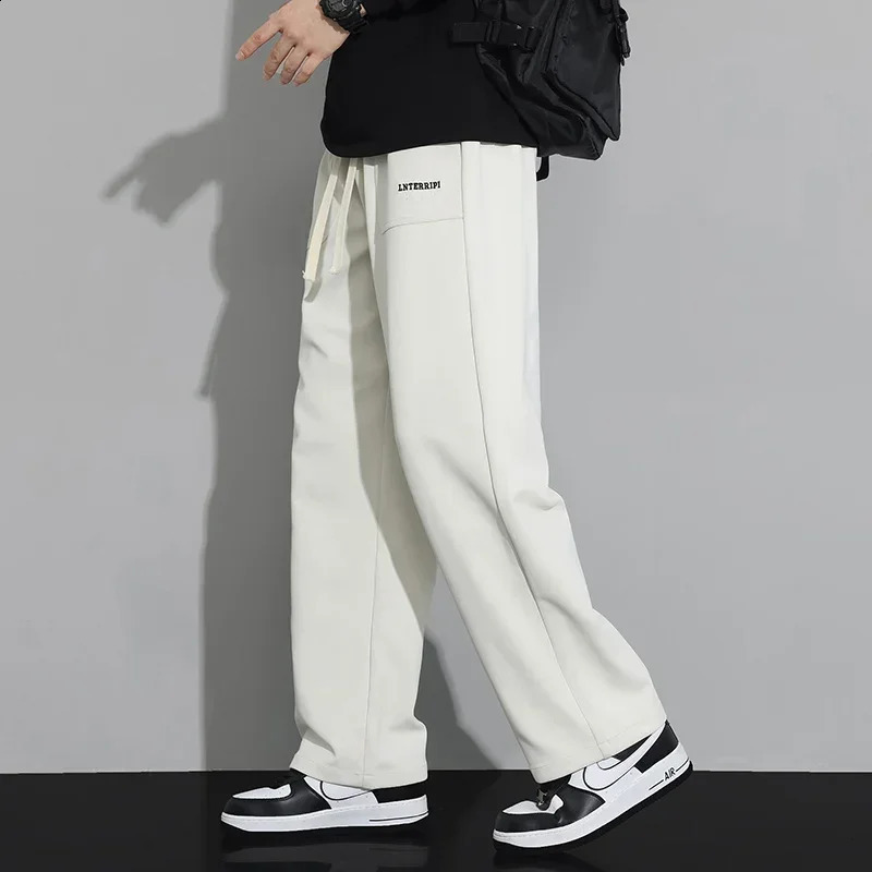 Pantalon de survêtement automne des hommes de joggeurs baggy broderie de qualité neutre tissu pantalon extérieur lâche Pantalon de jogging de fit