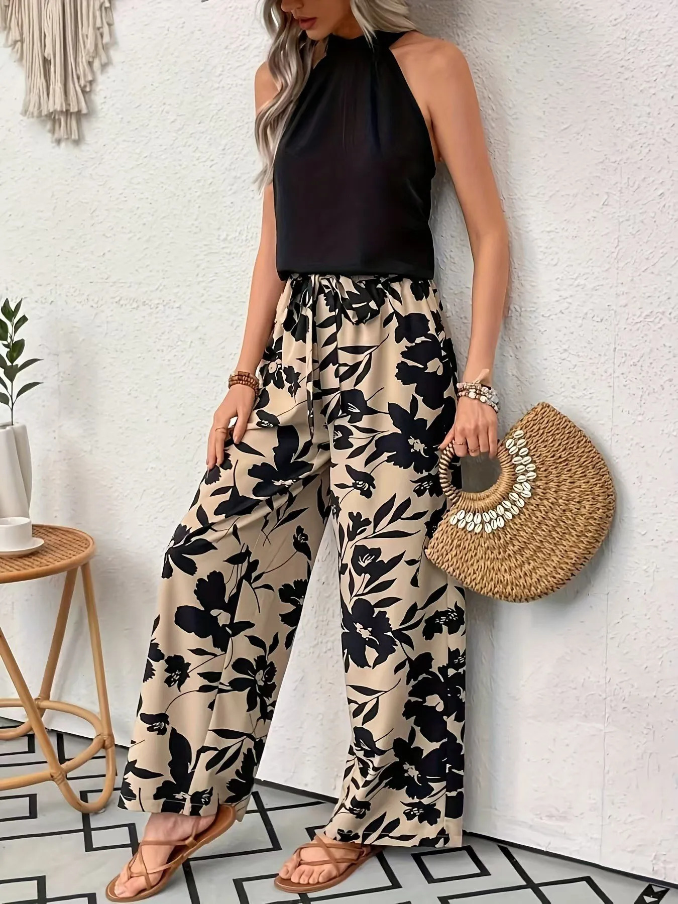 Womens casual long pants featuring a comfortable printed n elastic waistband and wide legs 250822
