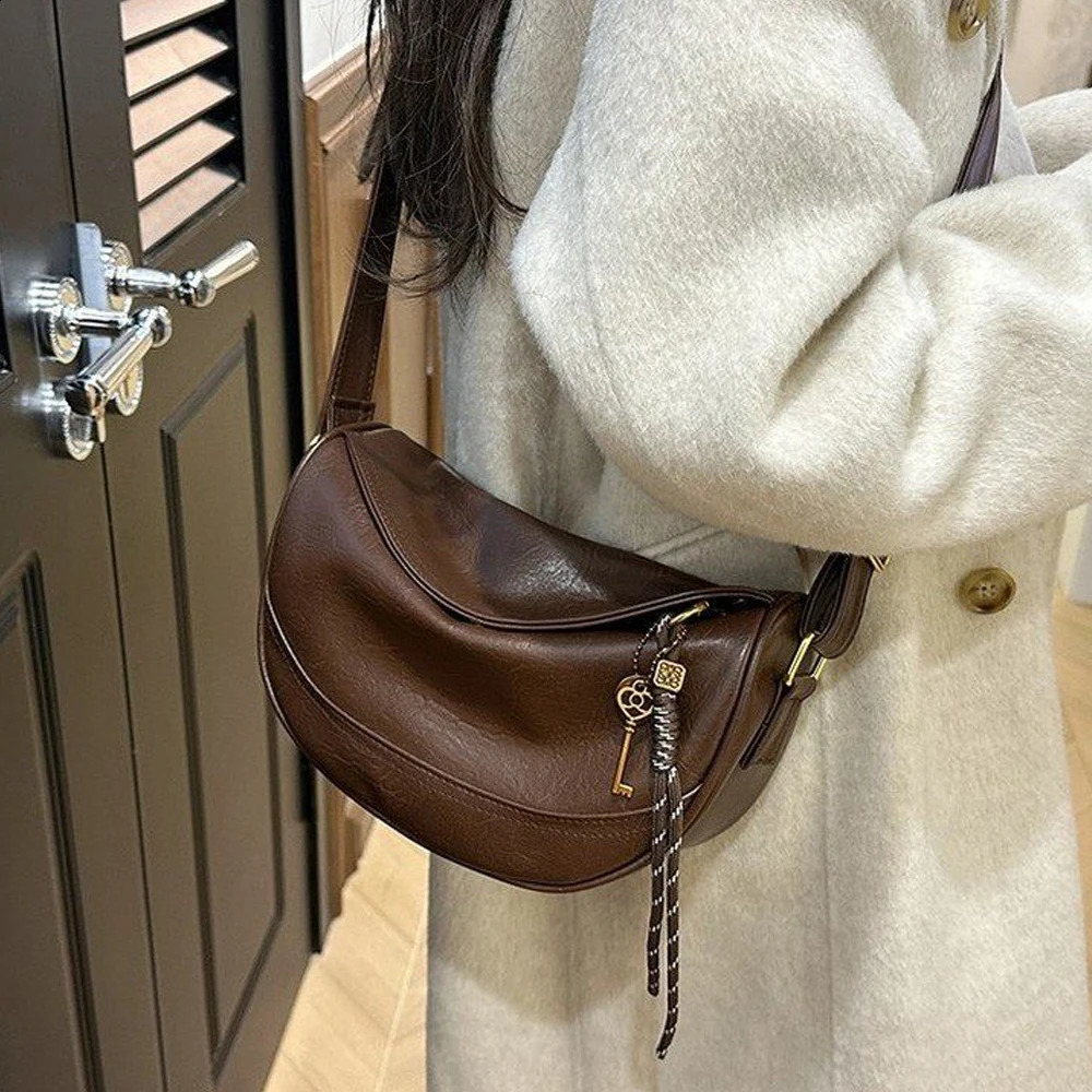 Simple and fashionable dumpling buns for women Korean version casual shoulder bag stylish texture solid color cr 250815