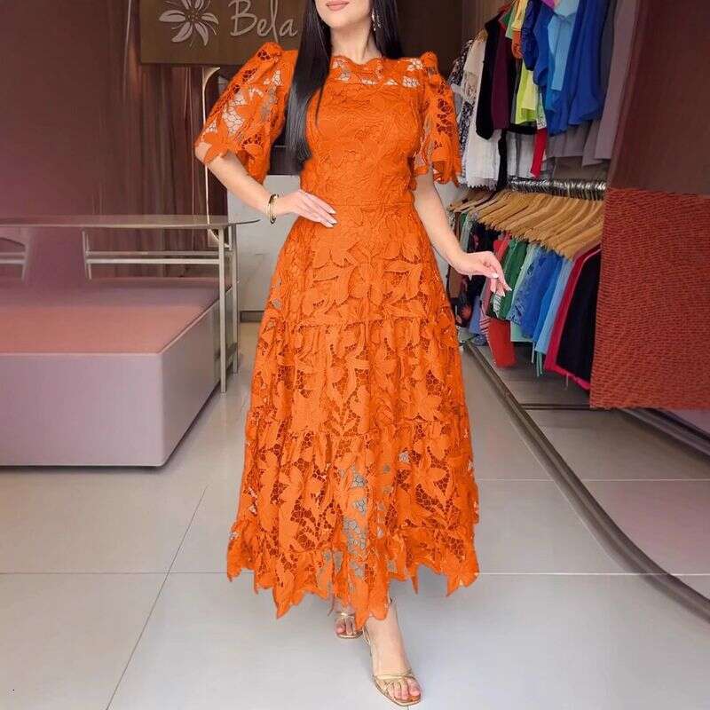 Robes robes d'été nouveau tempérament rond coude en dentelle creux robe vestimentaire pour femmes