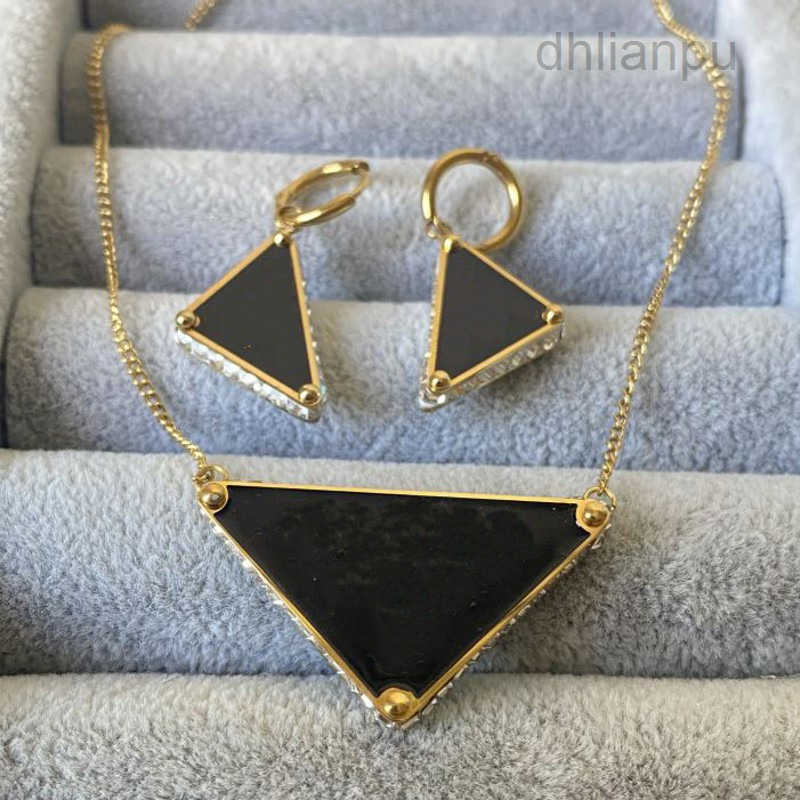 Collier de luxe boucles d'oreilles marque les colliers pendentifs noirs étalons en acier inoxydable