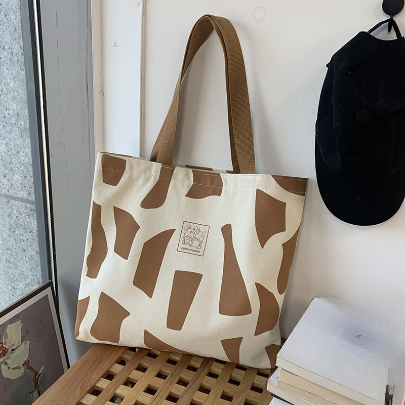 new trend model New Designer handbag Canvas Women s Shoulder leisure Bag Korean Zipper Art Design Handheld wrap