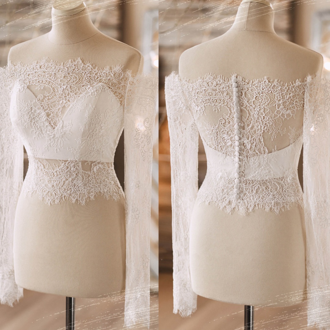 Capes nuptiale élégantes Veste de mariage en dentelle sans manches longues sur les accessoires de mariage sans manches
