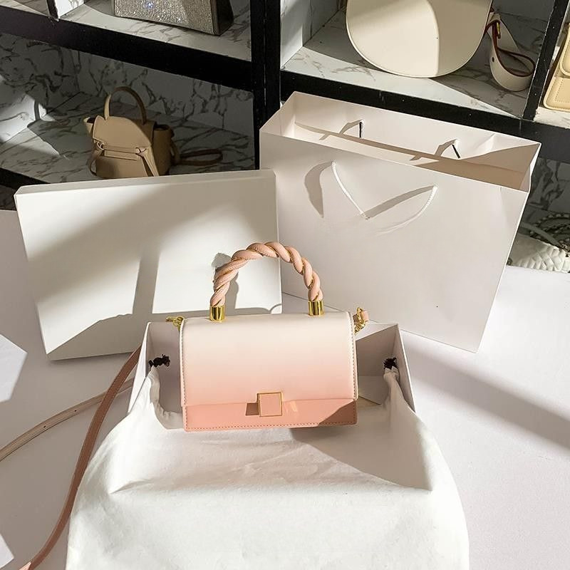 new model Women s Designer Handbag Celebrity Sweet Handheld Small trend Square New leisure Texture Single Shoulder Women s wrap Crossbody Bag
