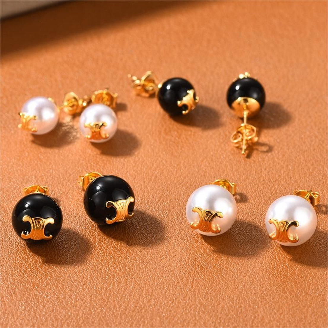 designer jewelry gold earrings luxury brand pearl ball earrings for women men simple black onyx wind oorbellen geometry tendency design nice earring