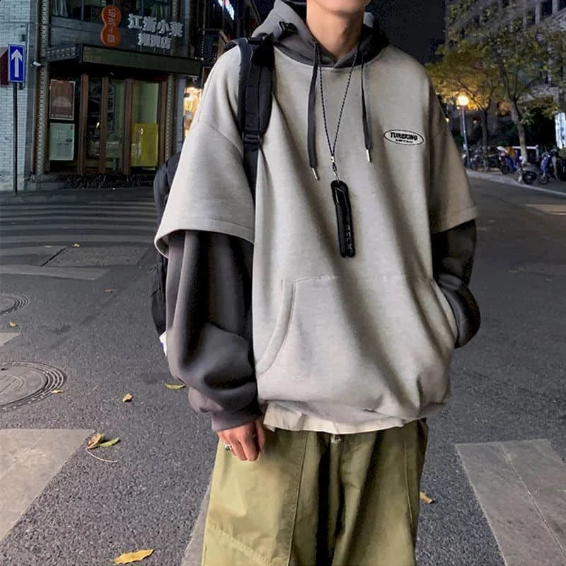 Hoodies men fake two-piece sweatshirt autumn stitching Korean loose contrast color hooded long-sleeved black white gray n 250818