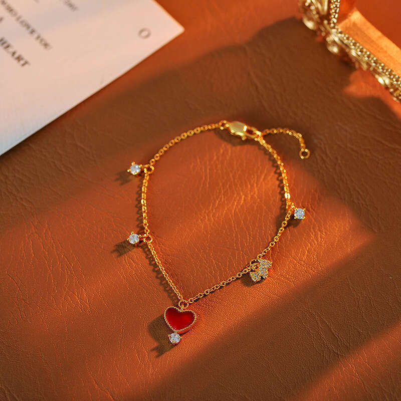 New Luxury jewelry designer bracelet for women high end Korean version red peach heart bracelet niche design sweet girlfriend Christmas festive atmo