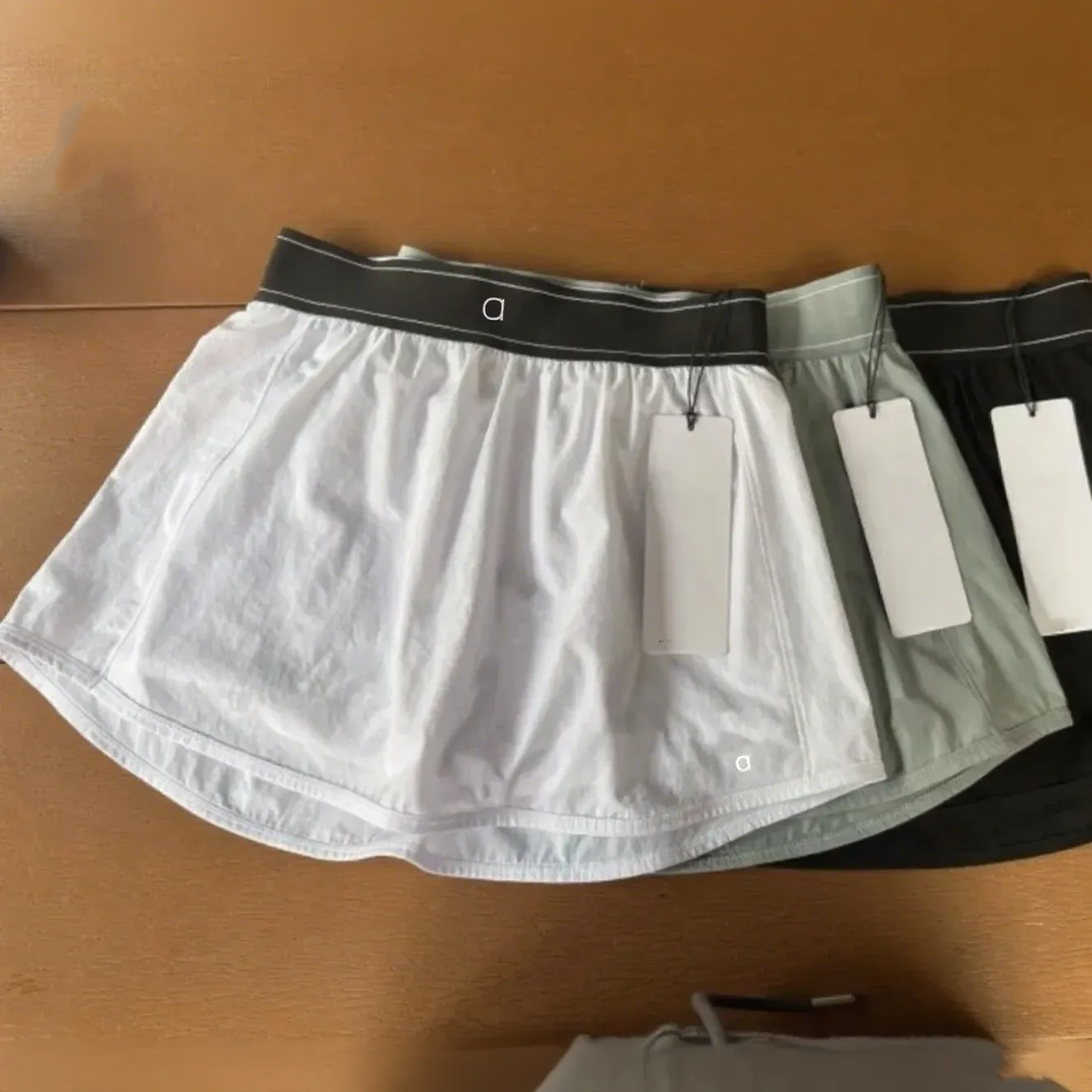 A785 Yoga Match Point Tennis Skirt Anti Glare Mini Varsity Skirt Quick Drying Breathable Sport Skirt Weekend Jogging Sweatpants Built Ins With Po-image-1069168046