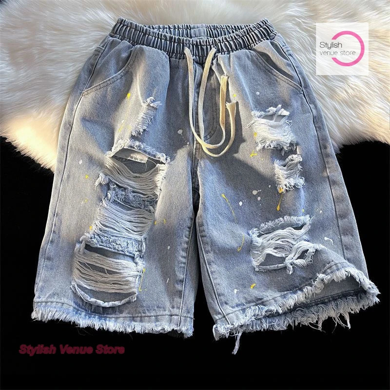 Koreanstyle denim shorts with holes in raw edges for womens summer high street plus size loose street hiphop paint pants. 250825