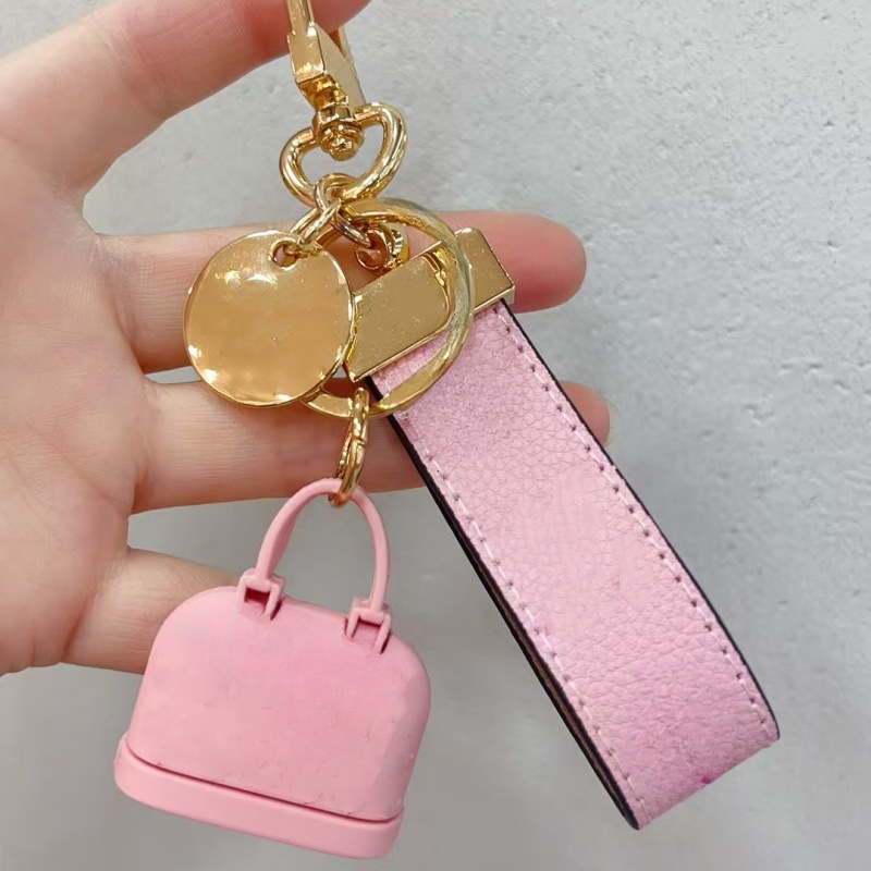 Amateurs de boucle Porte-clés faits à la main Hommes et femmes Sac Pendentif Accessoires de mode Mini Sacs à main Charms Designer Cuir Porte-clés