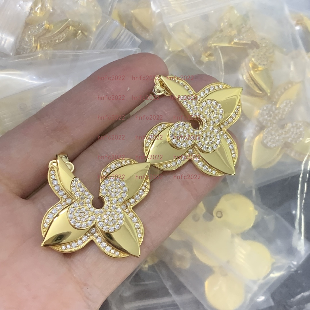 Four leaf clover pointed flower full diamond earrings female ins rotating windmill shaped design fashionable versatile accessories Gifts