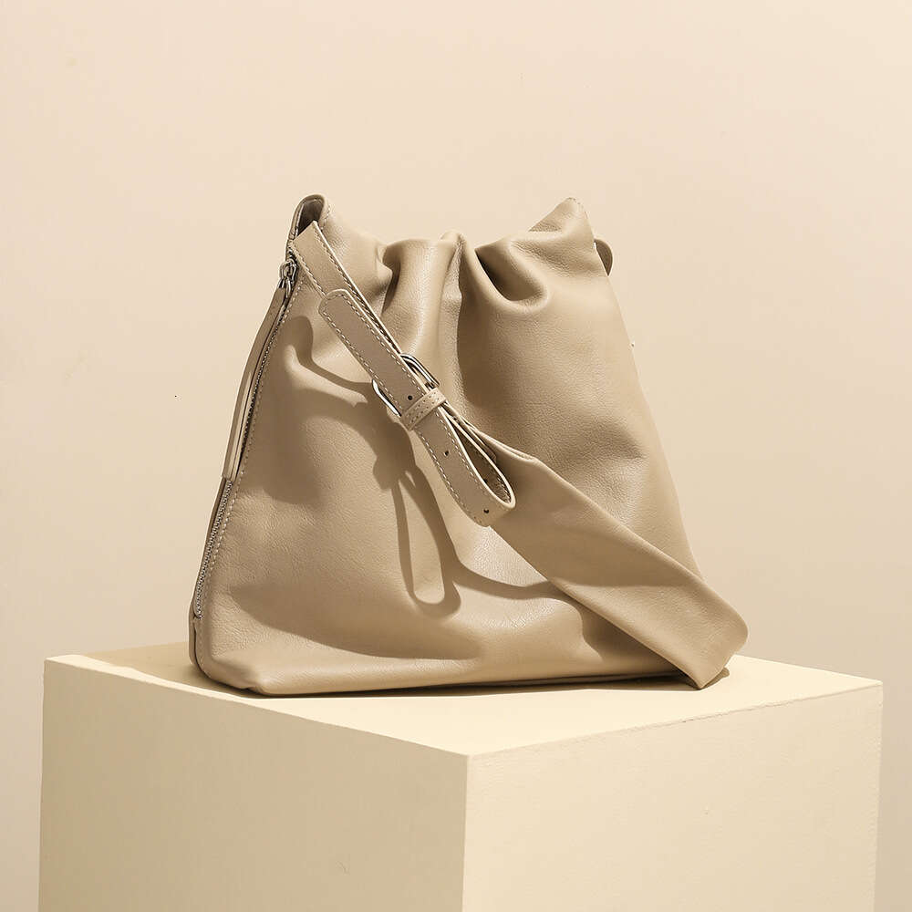 Luxury bag Top Layer Cowhide Wrinkled Tote Side Zipper Fashion Commuter Underarm High end Genuine Leather Single Shoulder Crossbody Bag