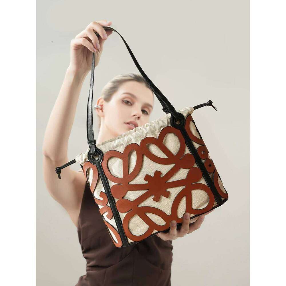 Underarm Tote Bag, Large Capacity, New Style, Women's Hand-Held Leather Hollow Out Commuting High-End Shoulder Bag