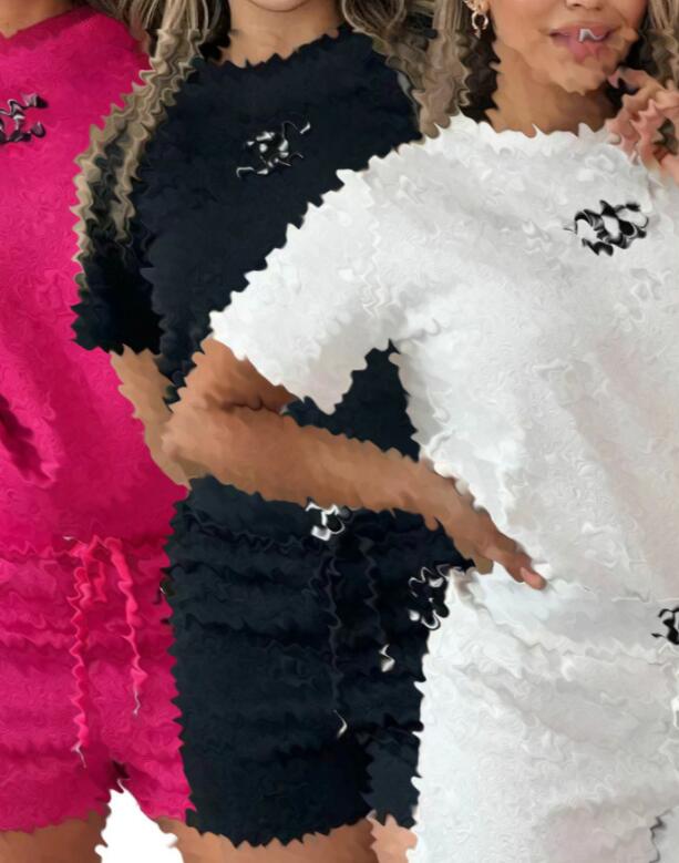 Summer new womens embossed Tracksuits sportswear luxury embroidery tied rope shorts short sleeved two-piece set black white pink Sweatshirts