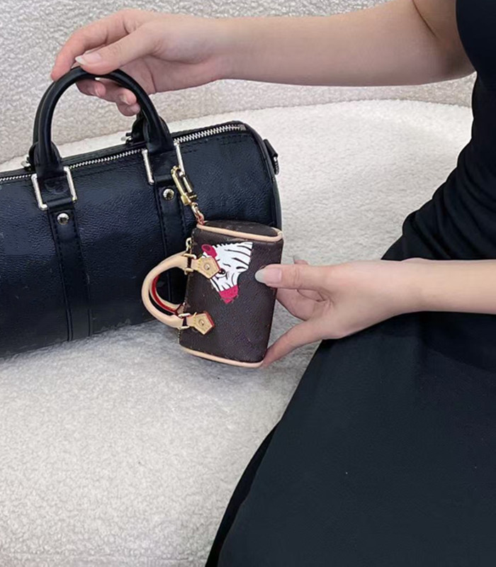 Designer Mini Speedys Sac charme pour femmes pour hommes clés clés clés en cuir Pendre classique monogramme Imprime-sac à bandoulière Fashion Gir
