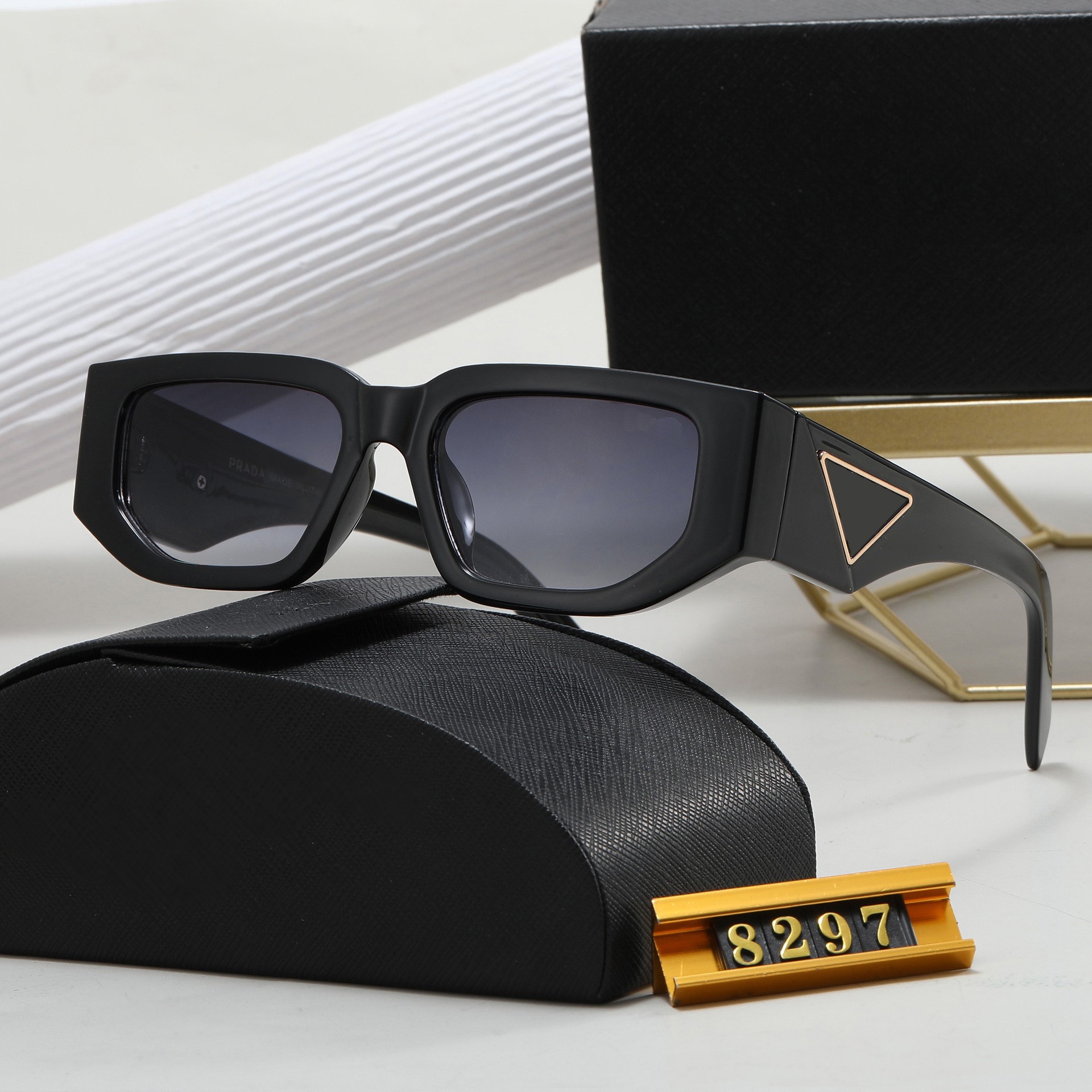 Lunettes de soleil de créateur pour femmes et hommes, lunettes de soleil de luxe portant des lunettes œil de chat triangulaires Signature : lunet
