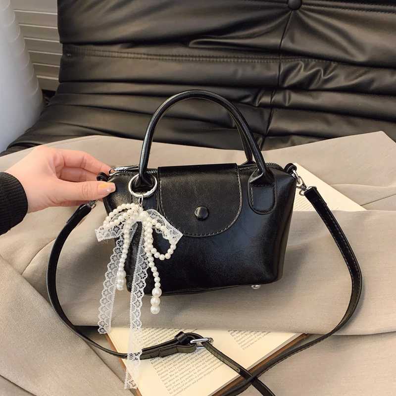 Sac à bandoulière parisien haut de gamme femmes minimalistes vintage design en cuir fourre-tout de luxe couleurs solides banlieue grande capacité