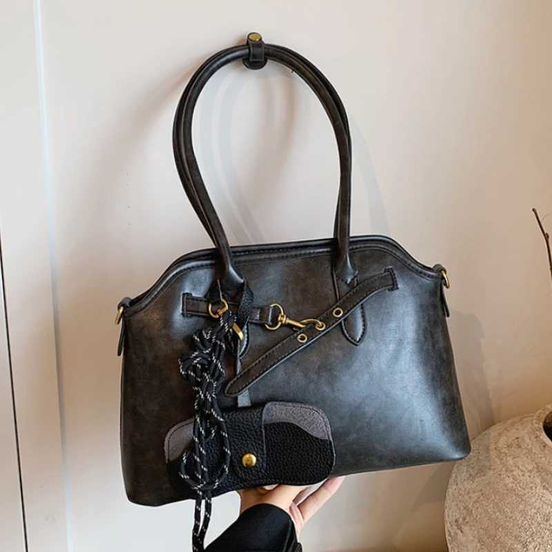 Retro womens shoulder bag PU womens leather handbag 2025 new trend Y2K Korean fashion womens horizontal bag womens handbagW250504