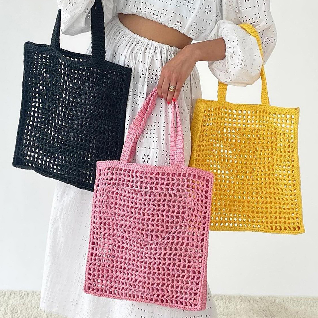 Nouveau style de luxe rose sac de créateur paille été femmes hommes tisser des sacs de plage évider sac à main embrayage fourre-tout bandoulière