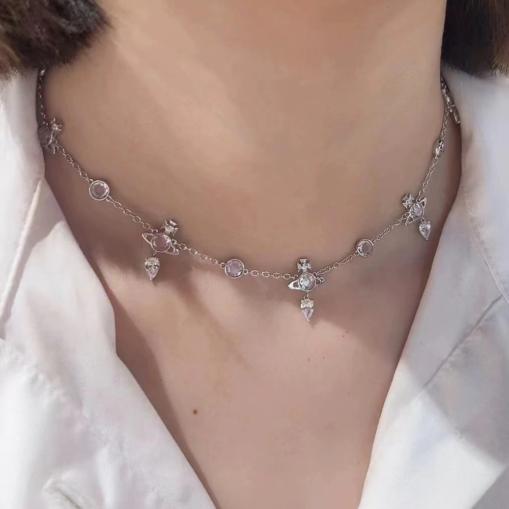 Designer Empress Dowager Saturne Crystal Diamond Diamond Water Drop Charm Sparkling Tassel Boucles d'oreilles Bracelet High Beauty Best Friend Gi