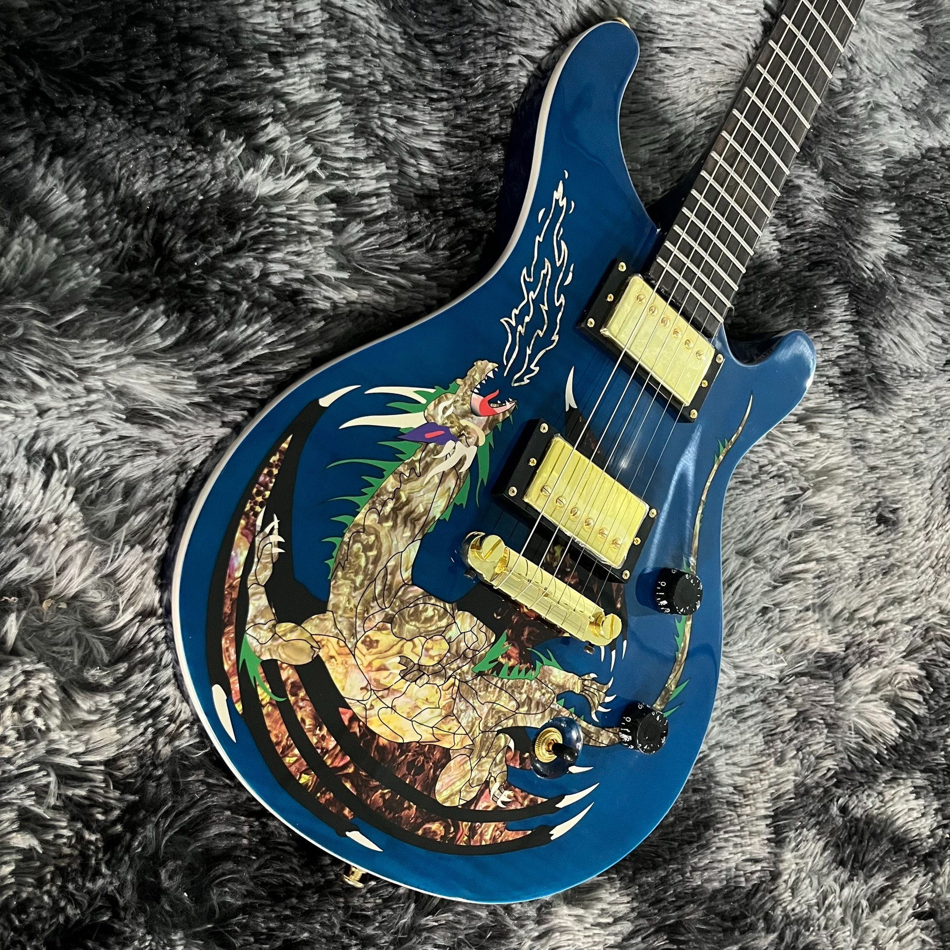 Double-Cutaway Electric Guitar: Bold Blue Finish, Colorful Dragon Artwork & Gold Humbuckers-image-1058136023
