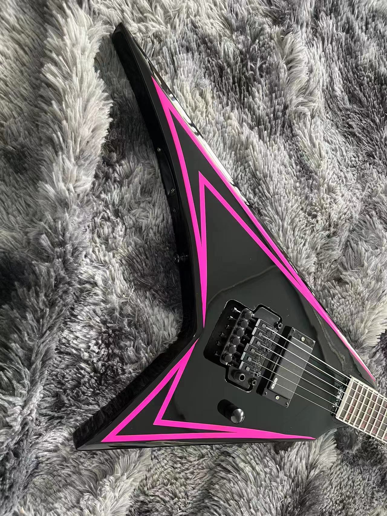 Bold Flying V-Style Guitar: Glossy Black Finish with Vibrant Pink V-Shaped Accents & Tremolo Bridge-image-1058629338