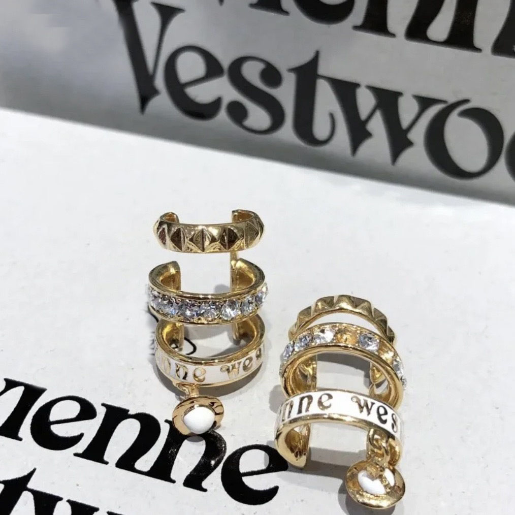 Designer Saturn pour femmes Star Planet Lettre Rivet Boucles d'oreilles à la mode Lumière Luxe Trois anneaux Diamant Zircone Design Punk Style Cl
