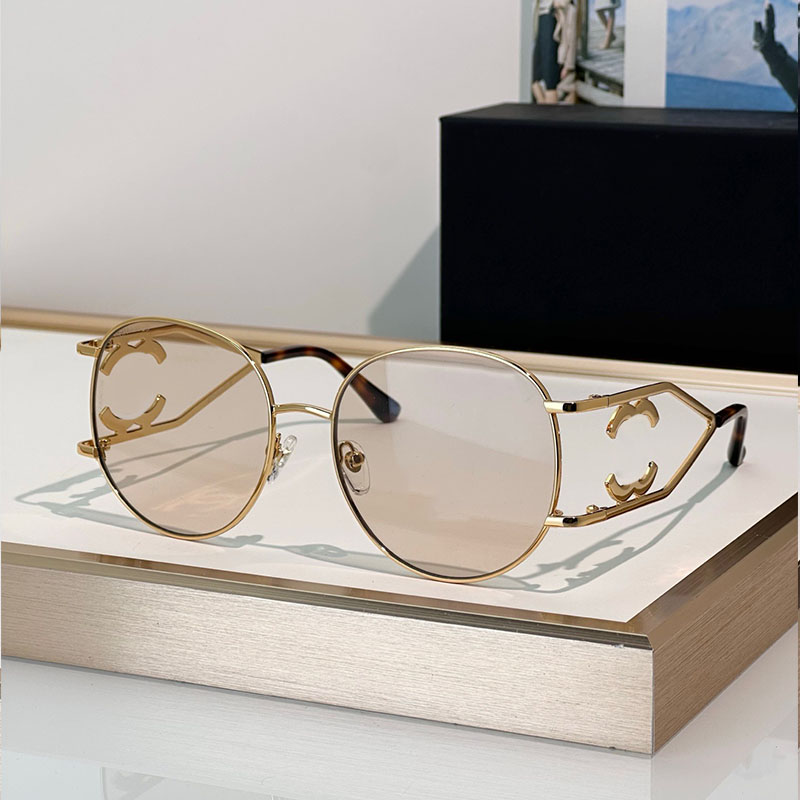 New Fashion Womens Circular Sunglasses 05258 Designer Metal Frame Personalized Mirror Legs Leisure Vacation Party Decorative Mirror Style Top Qualit