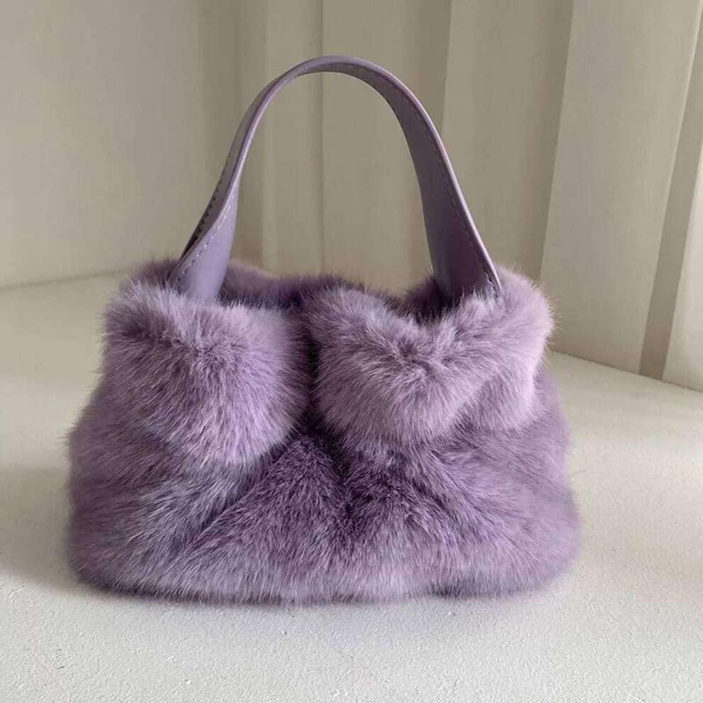 Artificier naturel 2024 luxe nouveau Design Faux fourre-tout doux fille chaud sac moelleux haute qualité fourrure sac à main Noble tempérament sa
