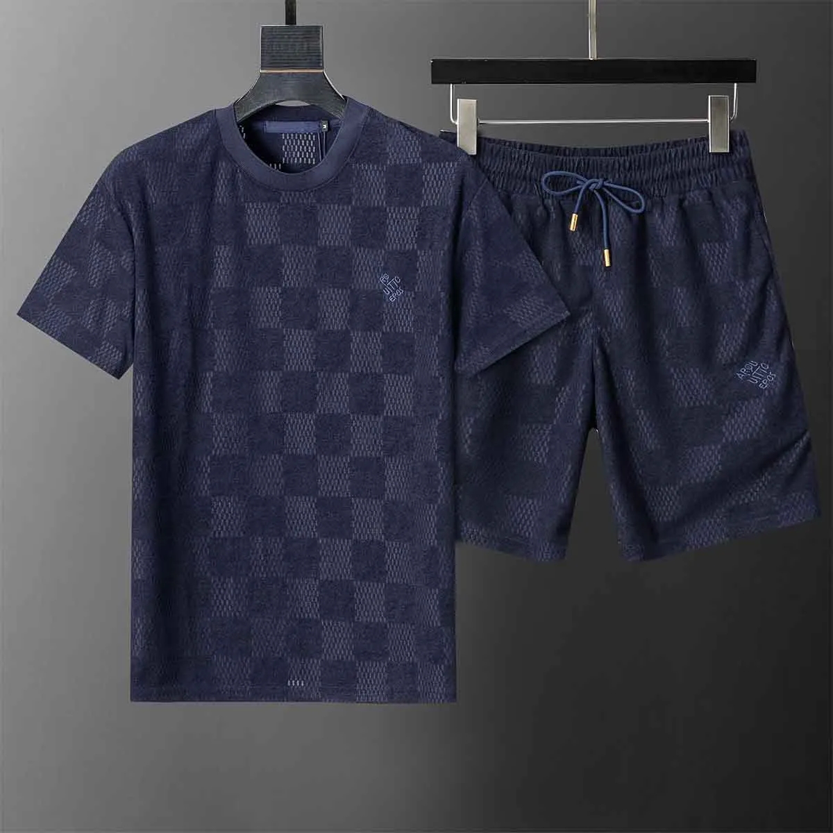 2026 Costume d'été de concepteur pour hommes polo chemise mode vêtements de sport imprimé t-shirt + short deux pièces ensemble costume de sport m
