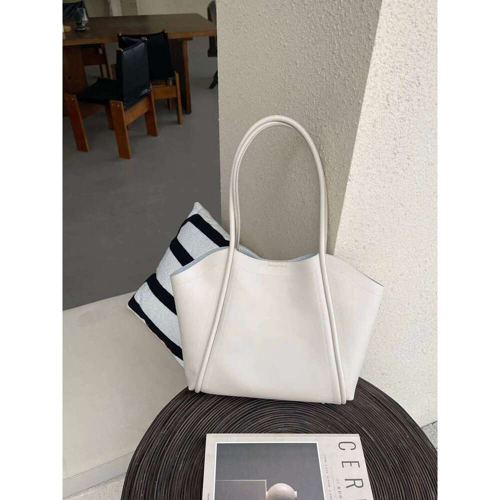 Aidrani New High-Capacity High-Quality Cowhide Bag, Simple And Casual Portable Women's Bag Suotong1205
