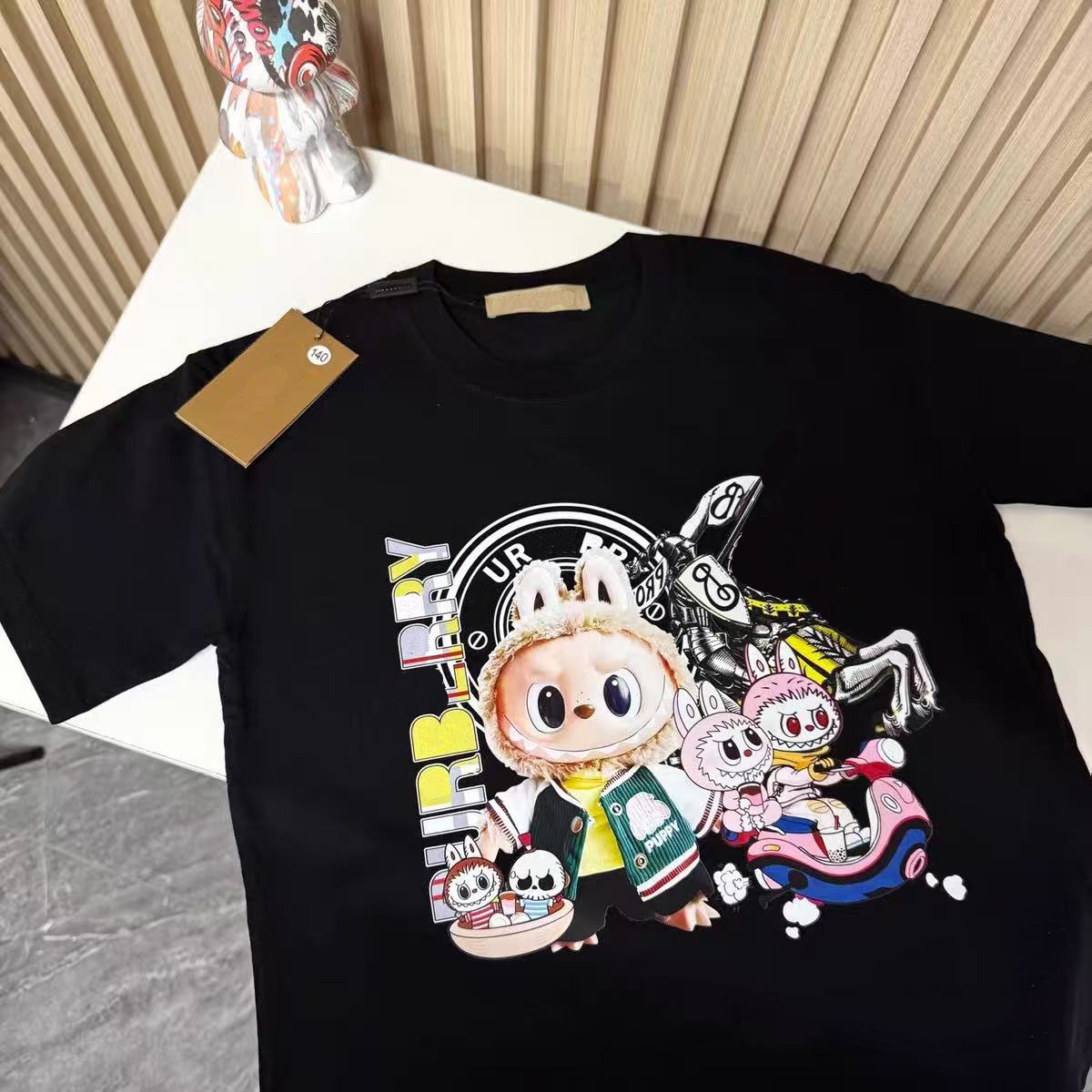 Produits européens T-shirts à manches courtes pour hommes été 2025 nouvelle tendance décontractée design ample sens vêtements à manches mi-longue